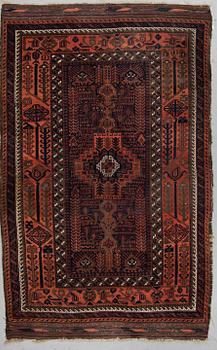 A RUG, semi-antique Baluch, ca 190,5 x 132,5 cm  (+ the ends have 10-11,5 cm flat weave on each side).