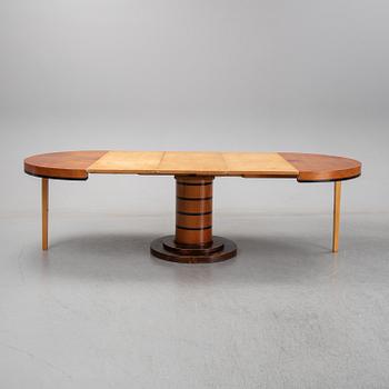 An elm veneered dining table, 1930's/40's.