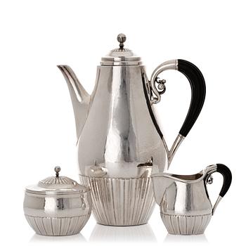 Johan Rohde, a three pieces sterling silver coffee service "Cosmos", Georg Jensen, Copenhagen 1945-77, design nr 45 A + D.