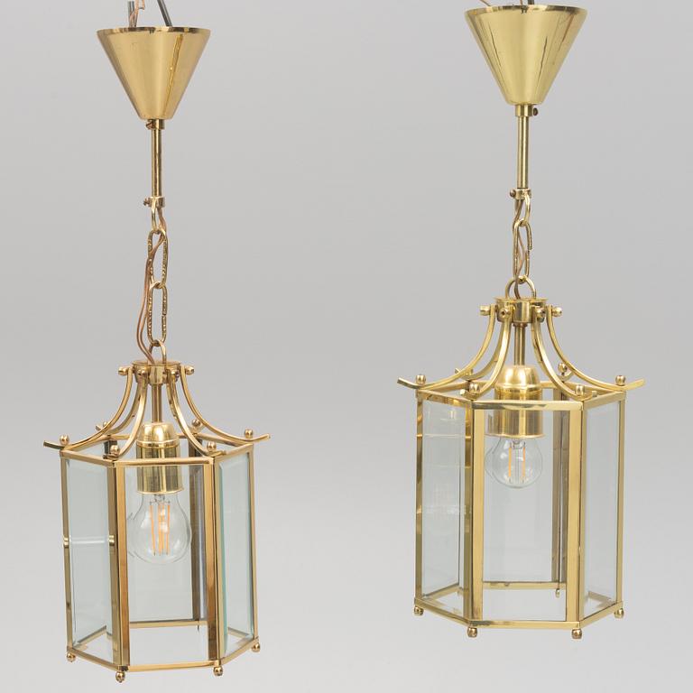 A pair of ceiling lights, later part of the 20th Century.