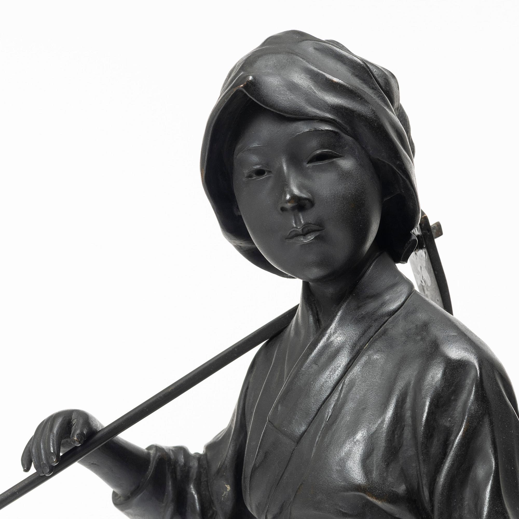 A large Japanese bronze okimono, early 1900s.