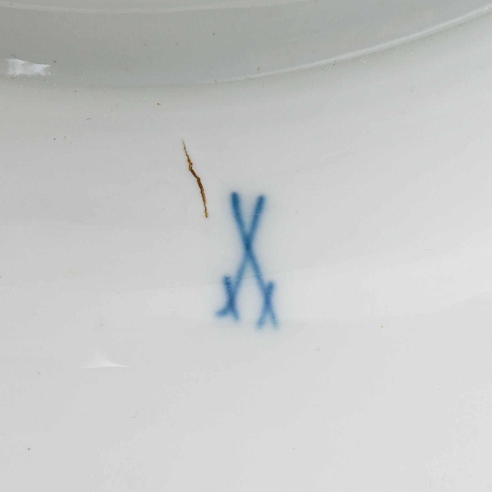 A Meissen Cupid porcelaine figure, 20th century.