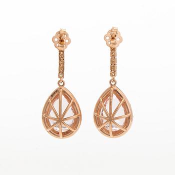 A pair of 18K gold earrings, with pear-cut morganites and diamonds.