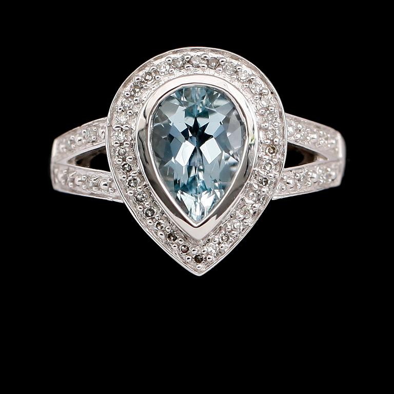 RING, 14 k vitguld, blå topas, diamanter tot 0.12 ct.