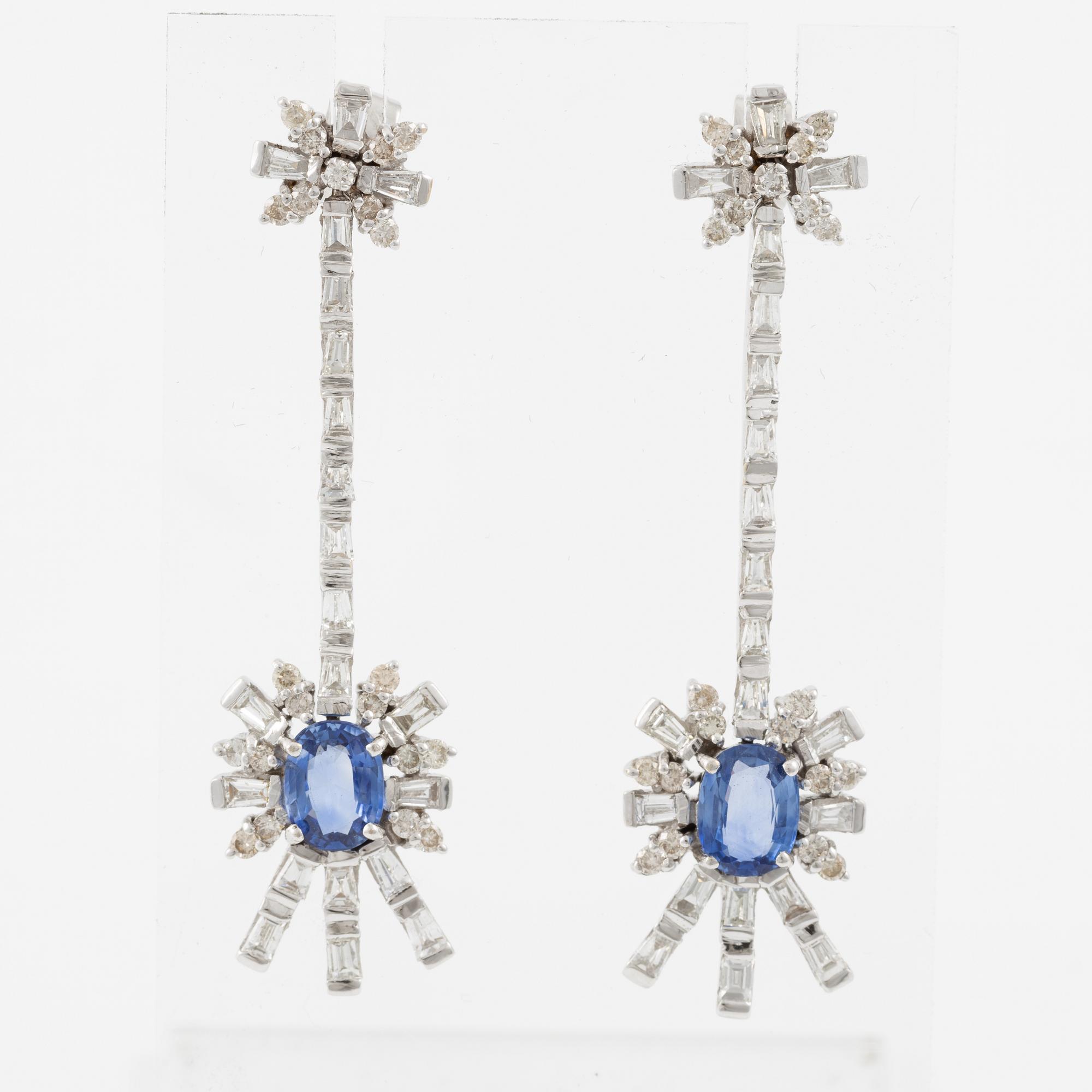 Earrings, 18K white gold set with sapphires and round brilliant-cut and baguette-cut diamonds.