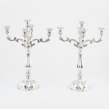 A pair of Austrian silver candelabra, unidentified makers mark, Vienna 1859.