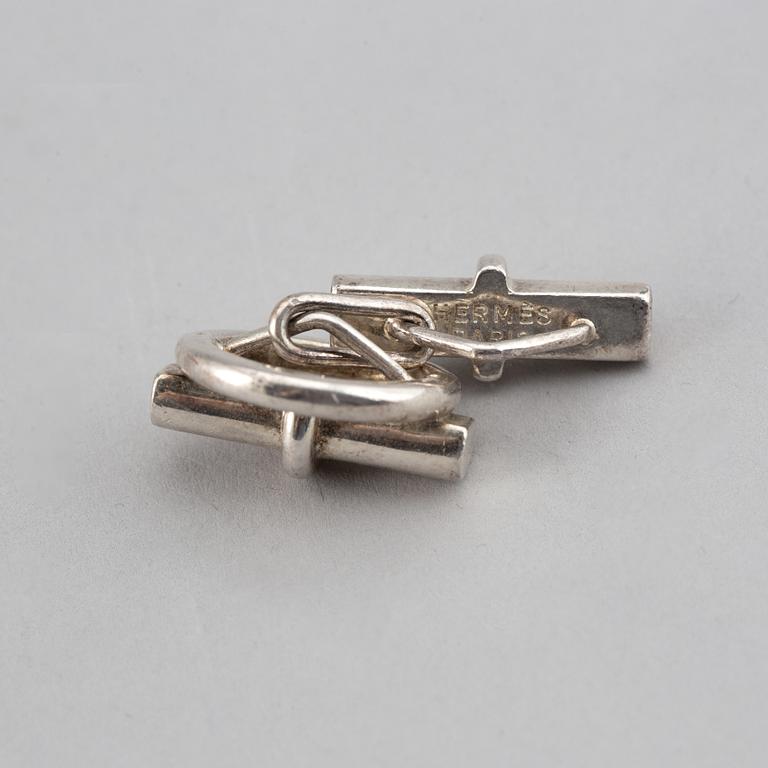 HERMÈS, a pair of silver cuff links.