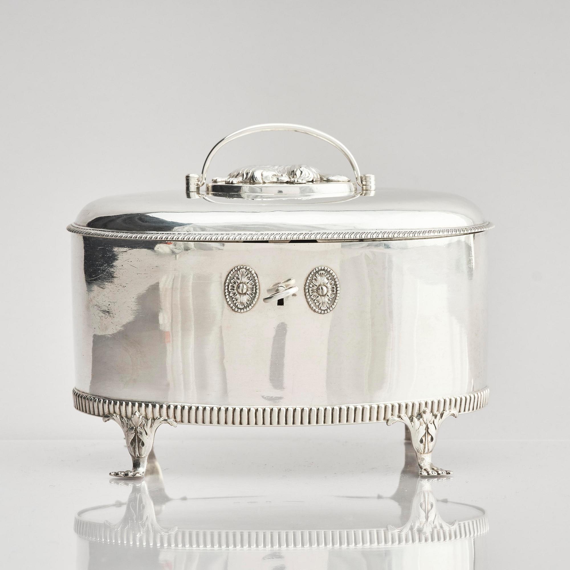 A Swedish 19th century silver sugar-casket and tong, marks of Adolf Zethelius, Stockholm 1819.