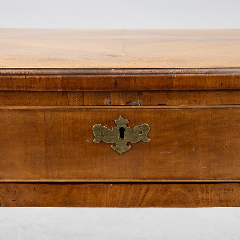 A George II walnut partner's desk, mid 18th century.