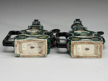 A pair of famille noire ewers with covers, Qing dynasty, 18th Century.