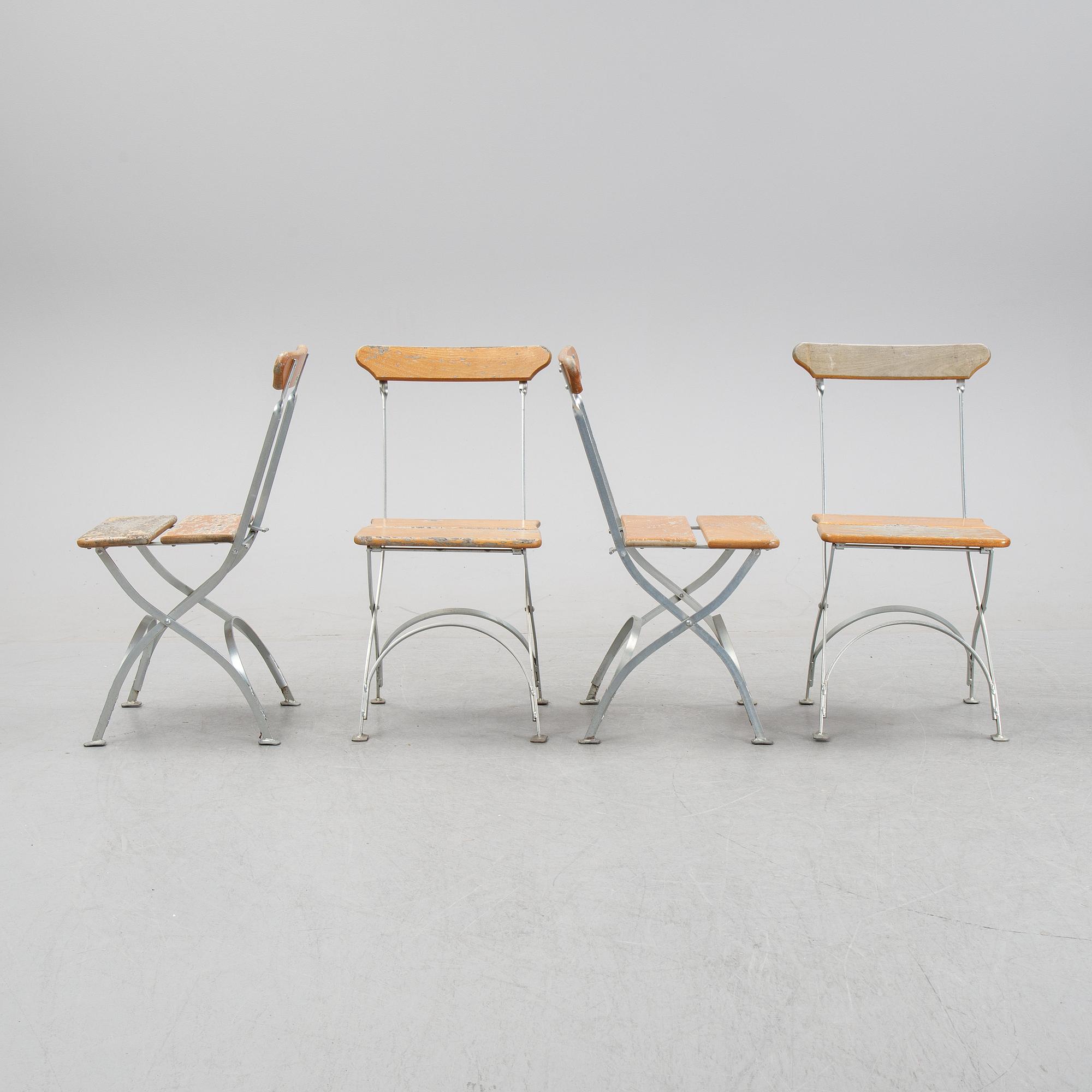 A set of four chairs and one table, Grythyttan, late 20th century.