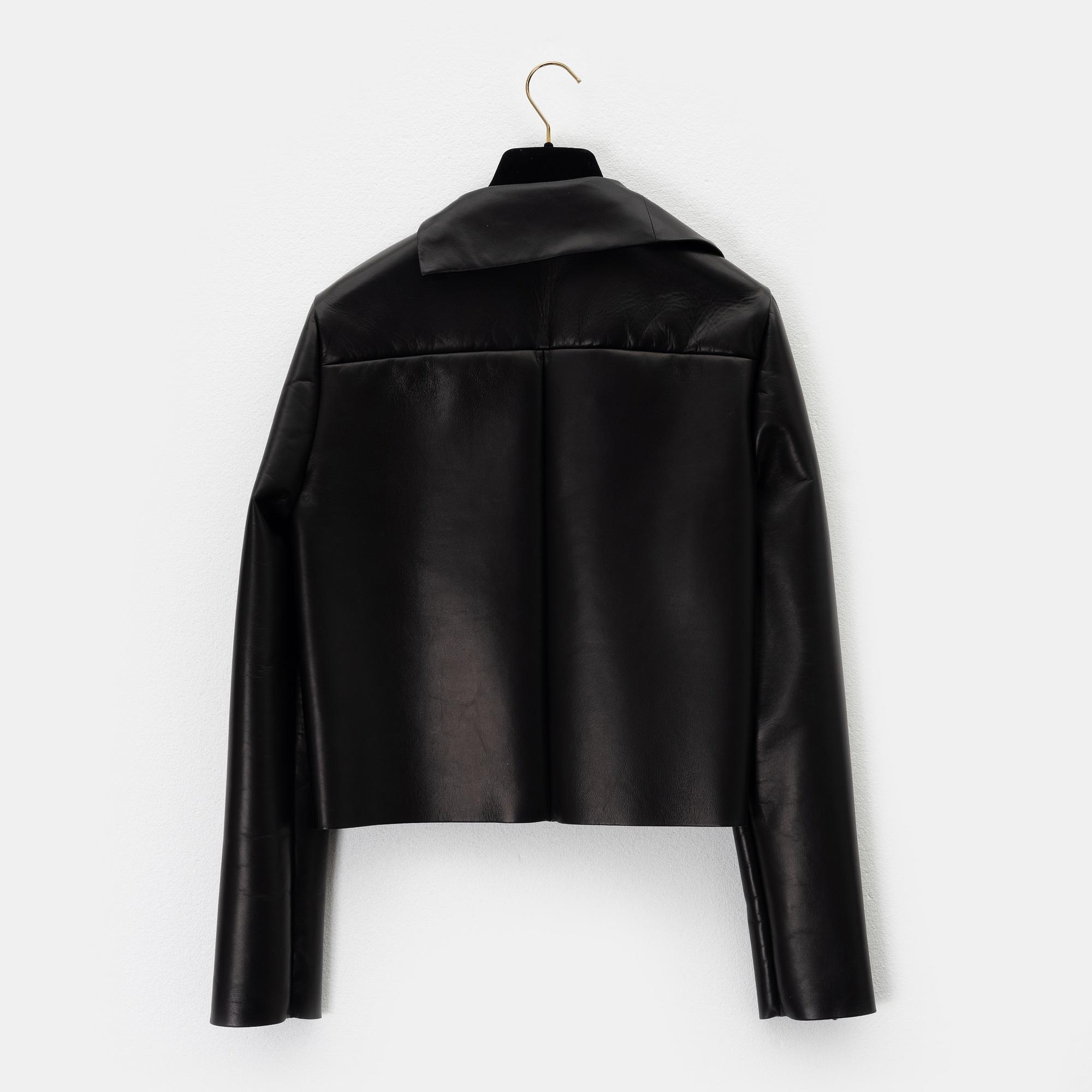 Céline, A black leather jacket, size 38.
