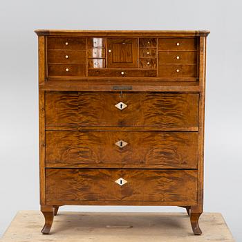 A birch-veneered dresser, second half of the 19th century.