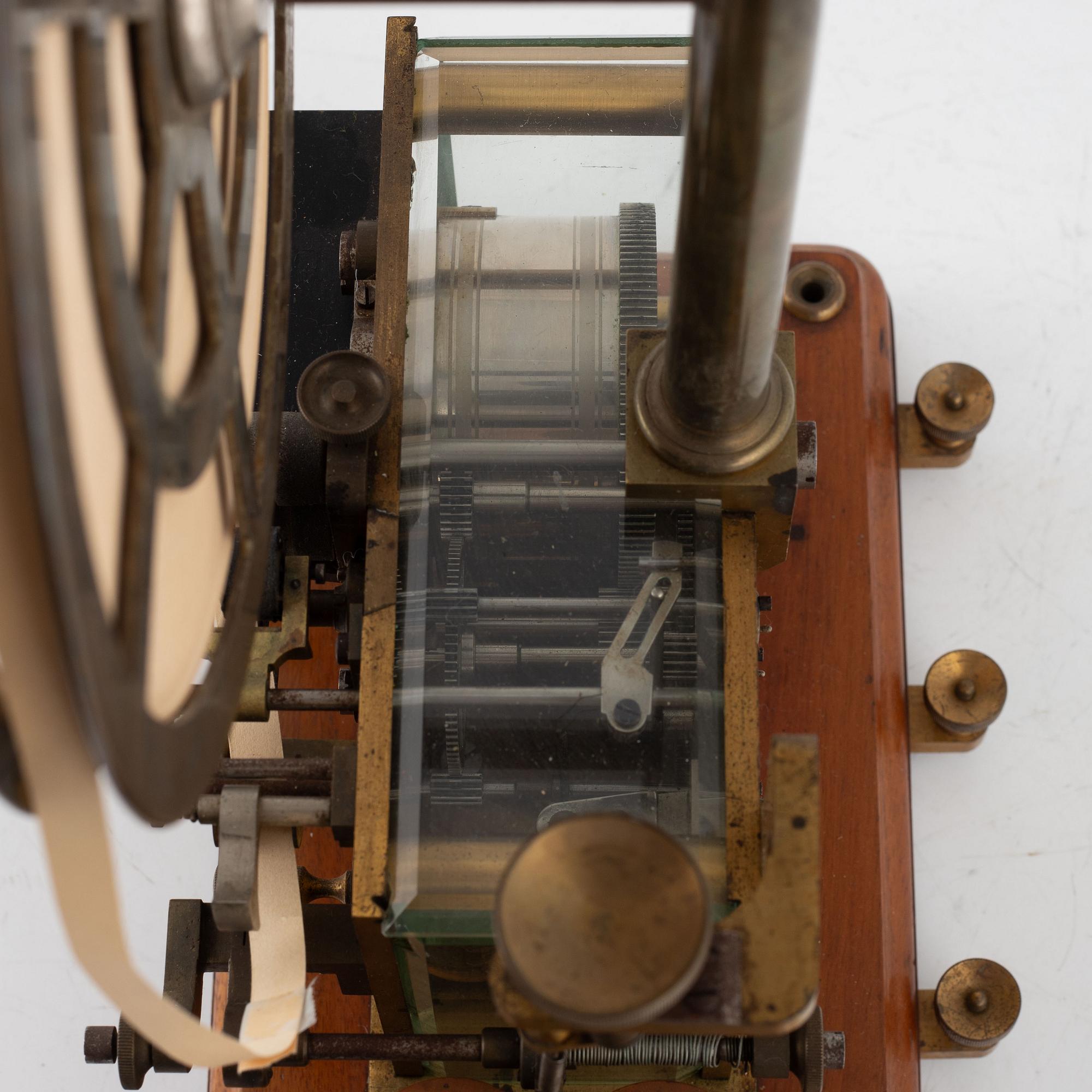 A telegraph from LM Ericsson, and a telegraph key from Digney Frères, early 20th century.