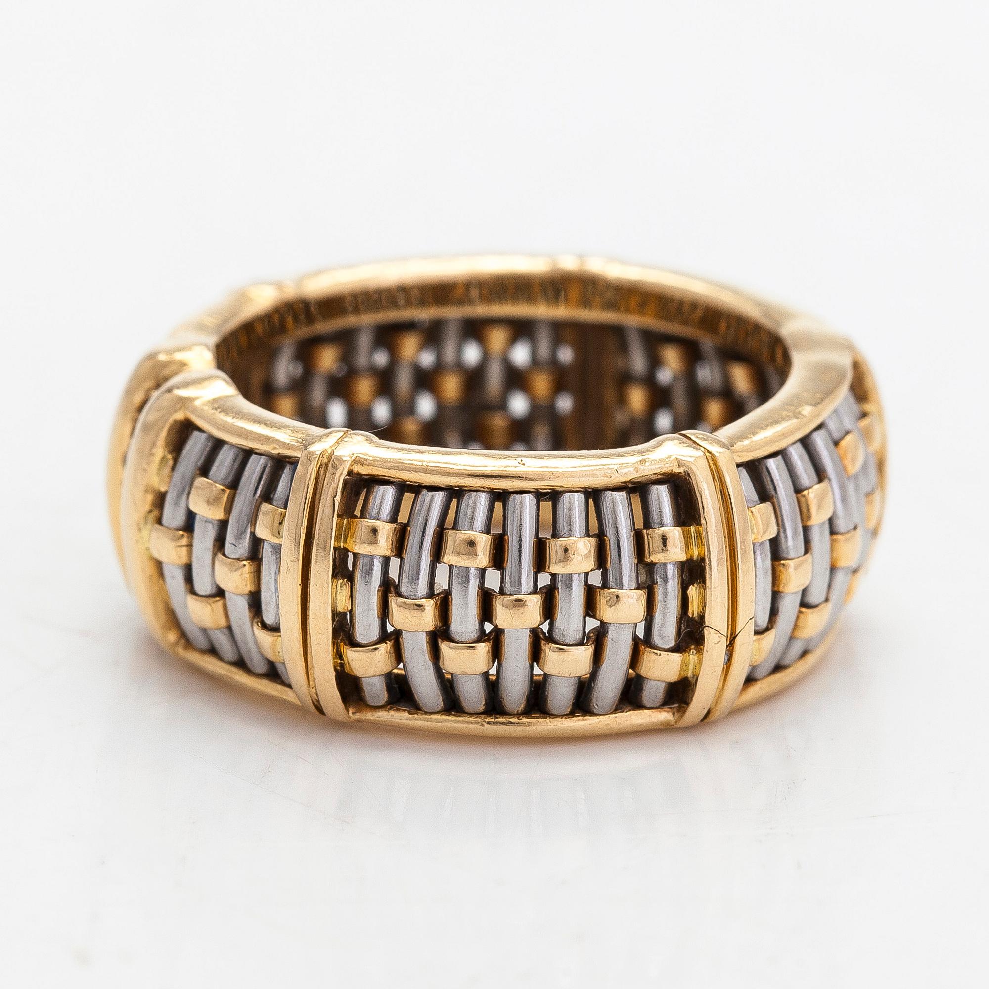 Cartier, ring, 18K guld och stål med briljantslipade diamanter.