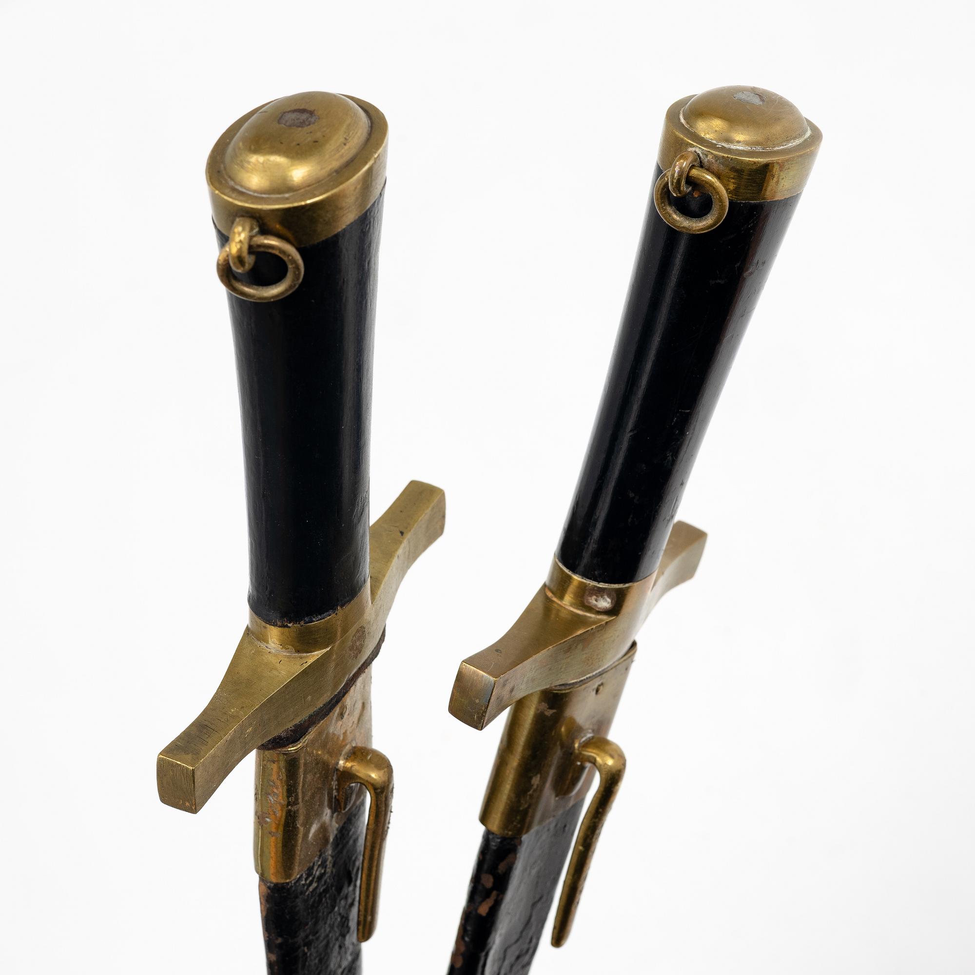 Two Swedish cutlasses 1856 pattern, with scabbards.