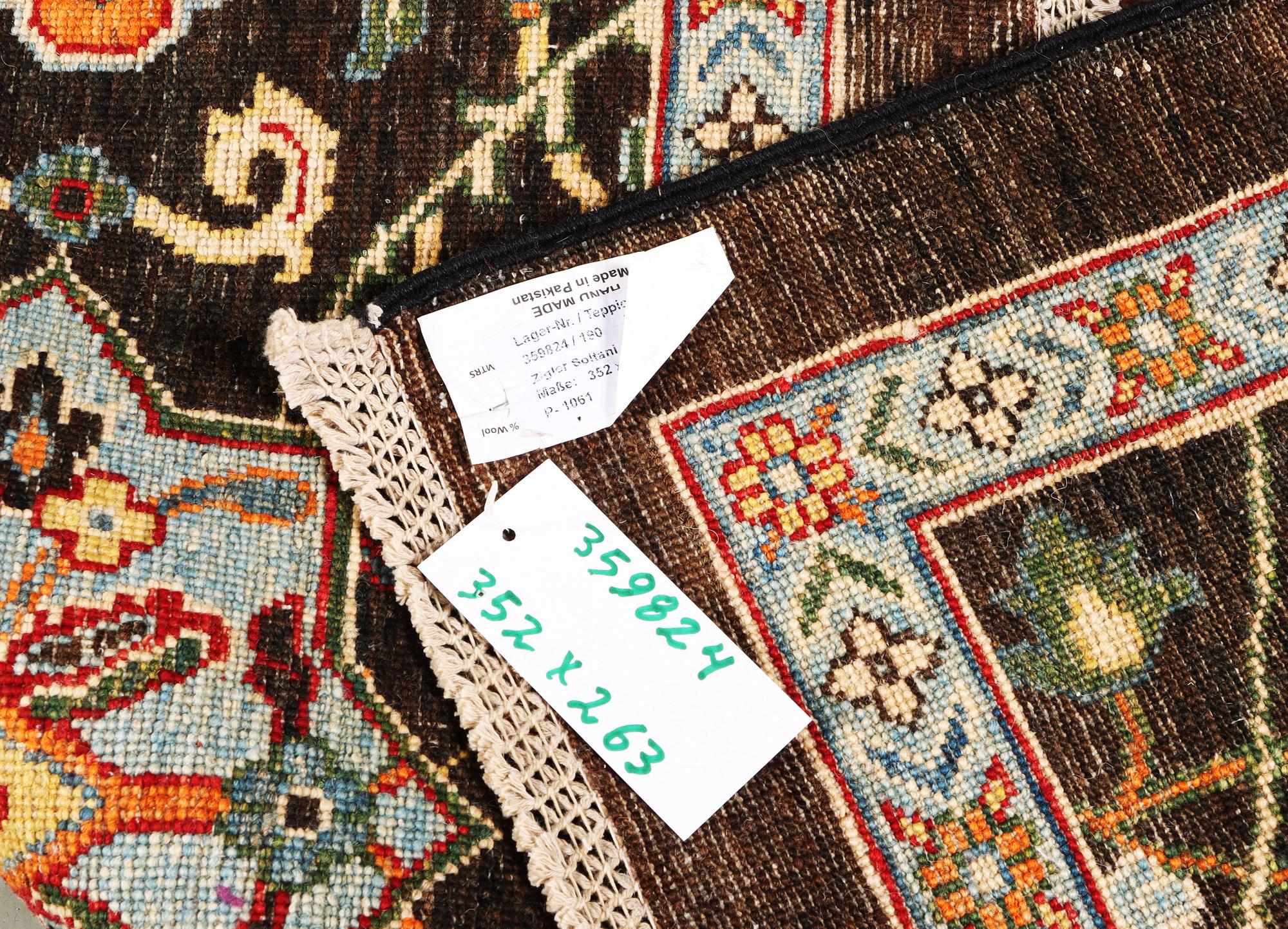 A Kazak carpet, c. 352 x 263 cm.