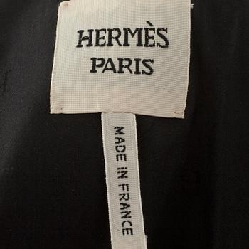 HERMÈS, a black leather suit jacket.