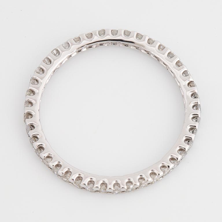 ALLIANSRING, tunn, 18K vitguld med runda briljantslipade diamanter.