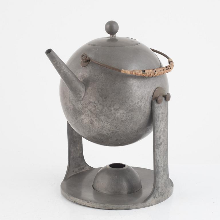 Nils Fougstedt, a tea kettle on stand model "A 942", Firma Svenskt Tenn, Stockholm 1929.