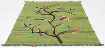 A hand-embroidered Kelim rug, 184 x 124 cm.