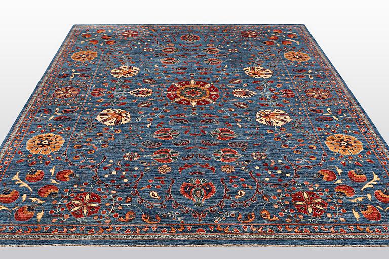 A carpet, Zeigler design, ca 312 x 254 cm.