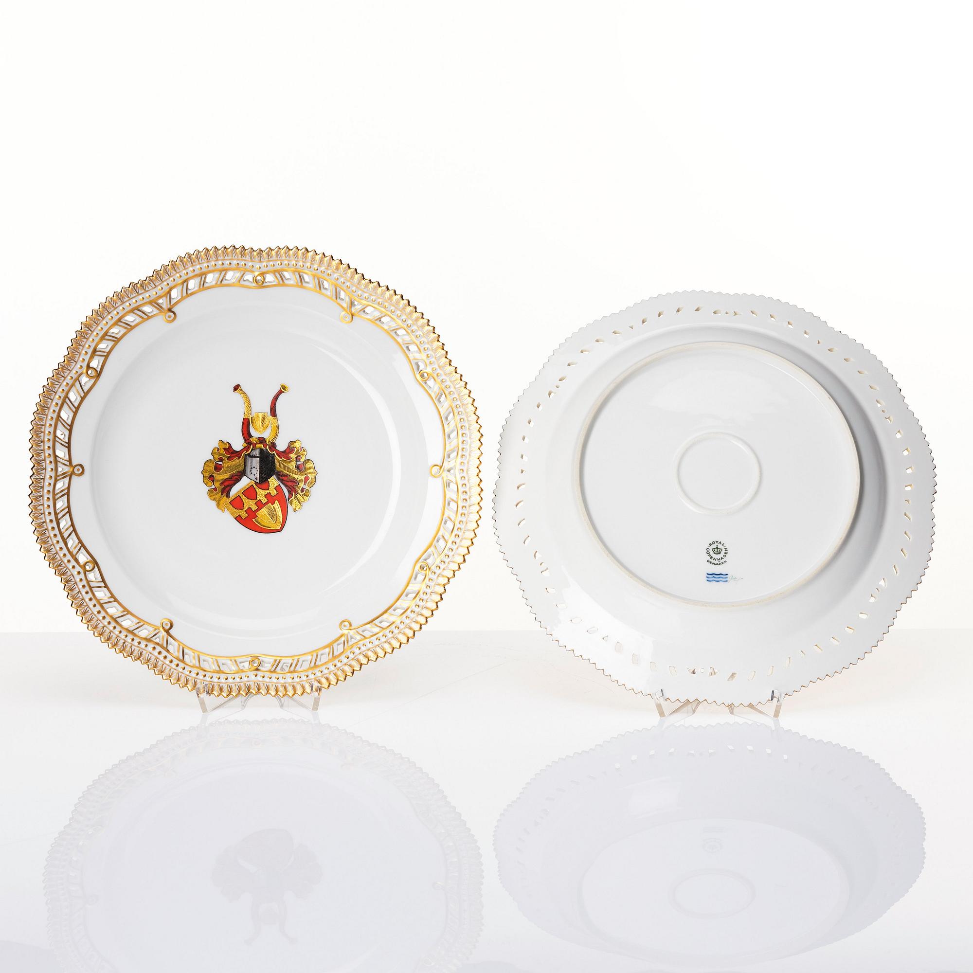A set of 12 Royal Copenhagen armorial dishes, Denmark, 20th Century.