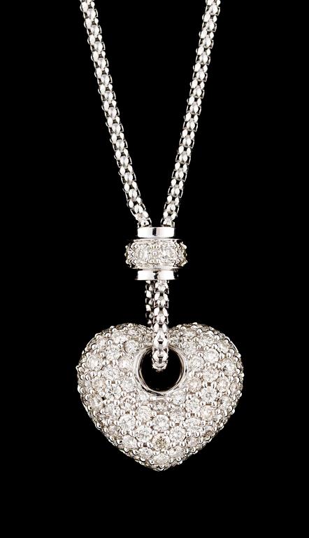 A heartshaped gold and diamond pendant with chain.
