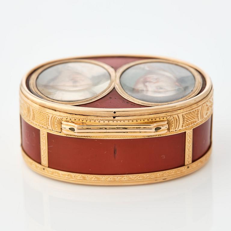 A French 18th century gold and red lacquer box, marked in Paris 1777-1778.