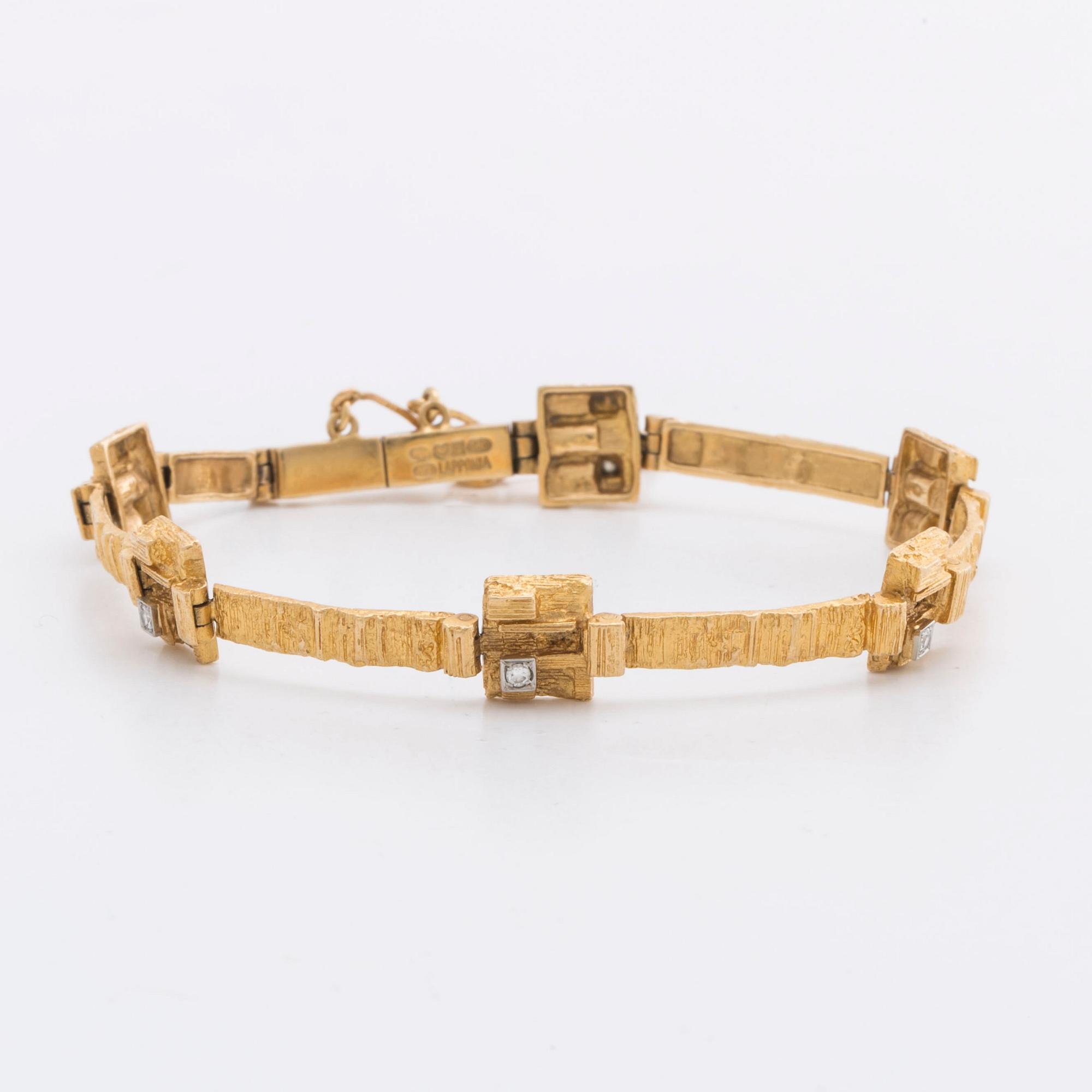 LAPPONIA ARMBAND 18K guld m 6 diamanter 8/8 0,12 ct totalt enligt gravyr, Finland 1976.