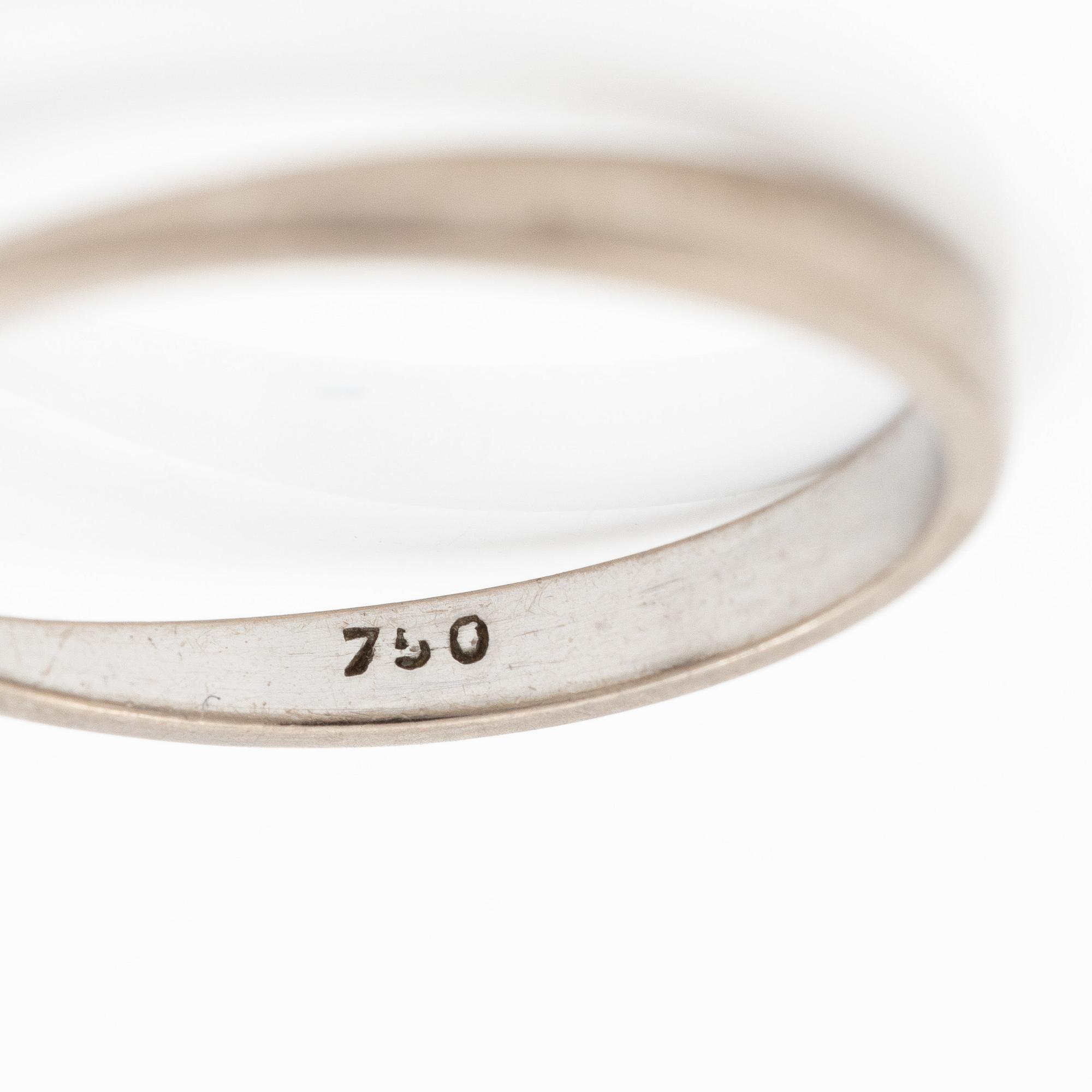 Ring, 18K white gold, with a small brilliant-cut diamond.