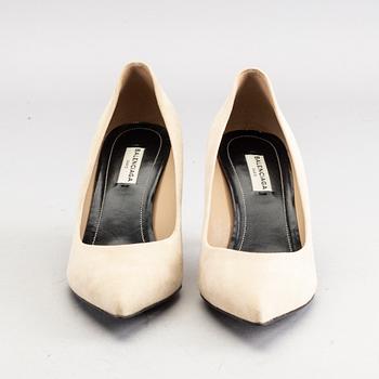 A pair of Balenciaga beige suede shoes size 38.