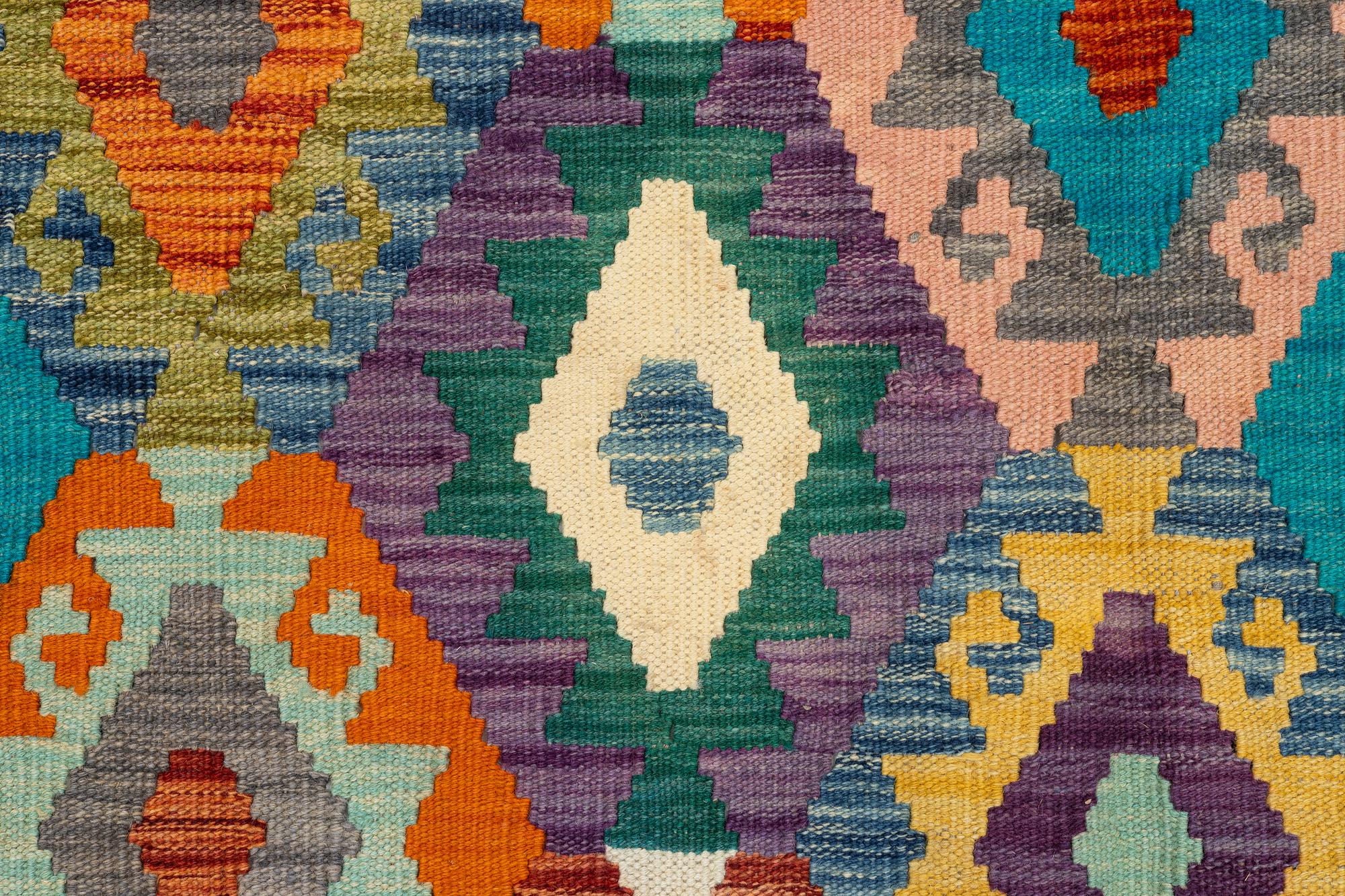 An, Afghan kilim carpet, c. 496 x 319 cm.