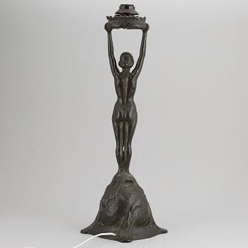 GERDA SPRINCHORN, an Art Nouveau green patinated bronze lamp "The Sun", Herman Bergman, Stockholm, early 20th century.