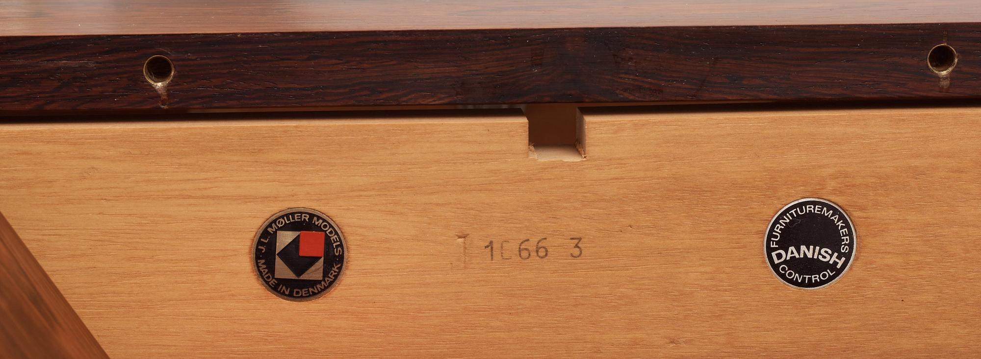 A Niels Ole Møller palisander dining table and nine chairs, J.L. Møller, Denmark 1950's-60's.