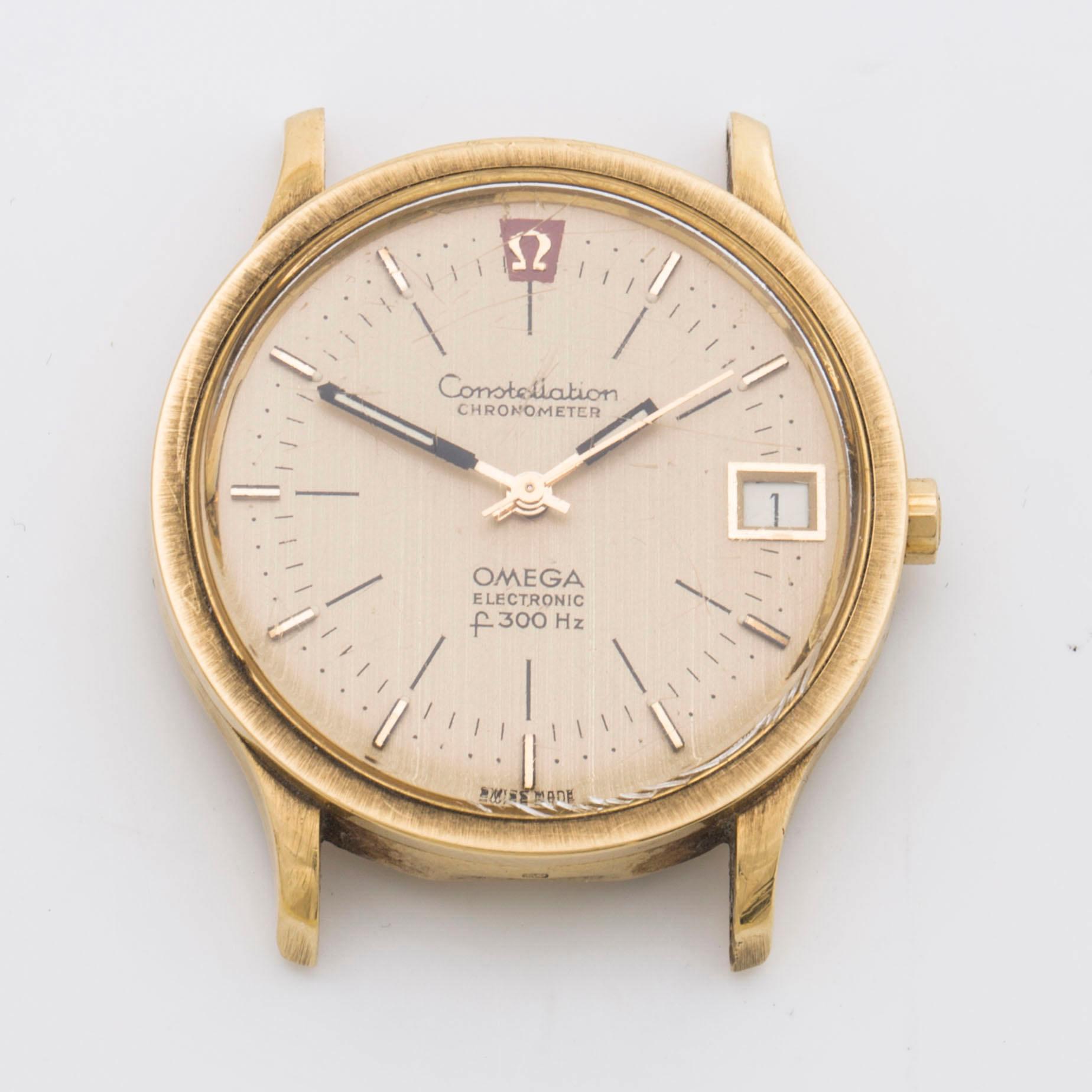 OMEGA Constellation Chronometer Electronic f 300 Hz 18K gold wristwactch 35 mm. Bukowskis