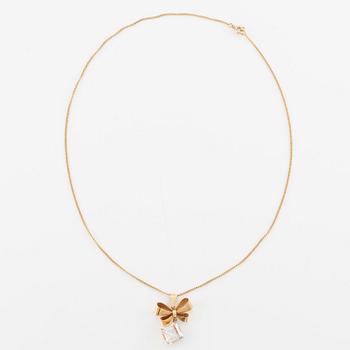 Necklace, 18K gold with synthetic white stone, in the shape of a bow.