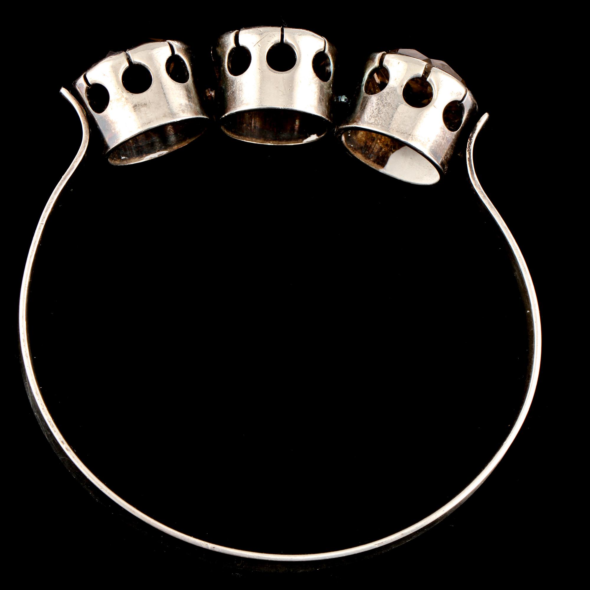 ARMRING, sterlingsilver med fasettslipad rökkvarts, Alton, Falköping, 1966. Vikt 34 g.