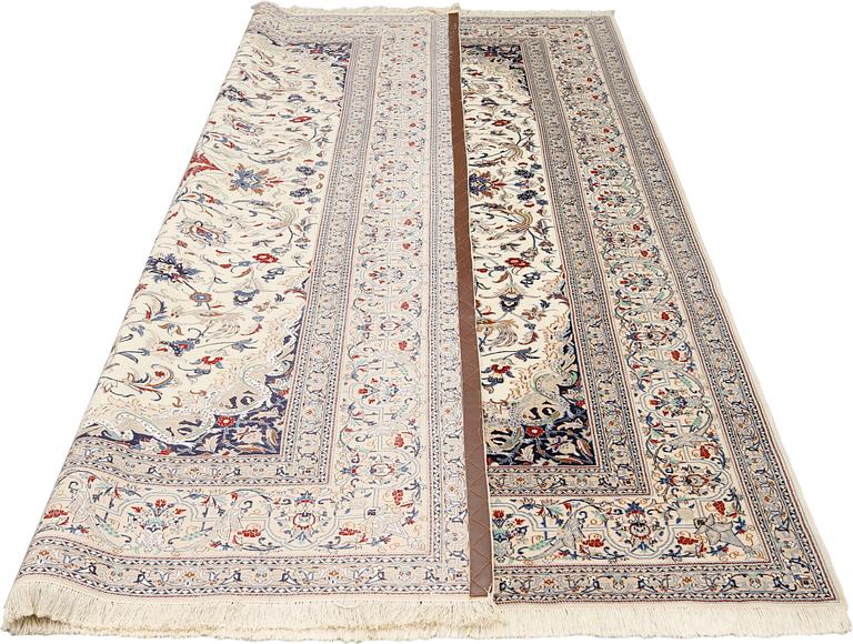 A Nain figural carpet, Part Silk, S.K 6LAA, c. 304 x 205 cm.