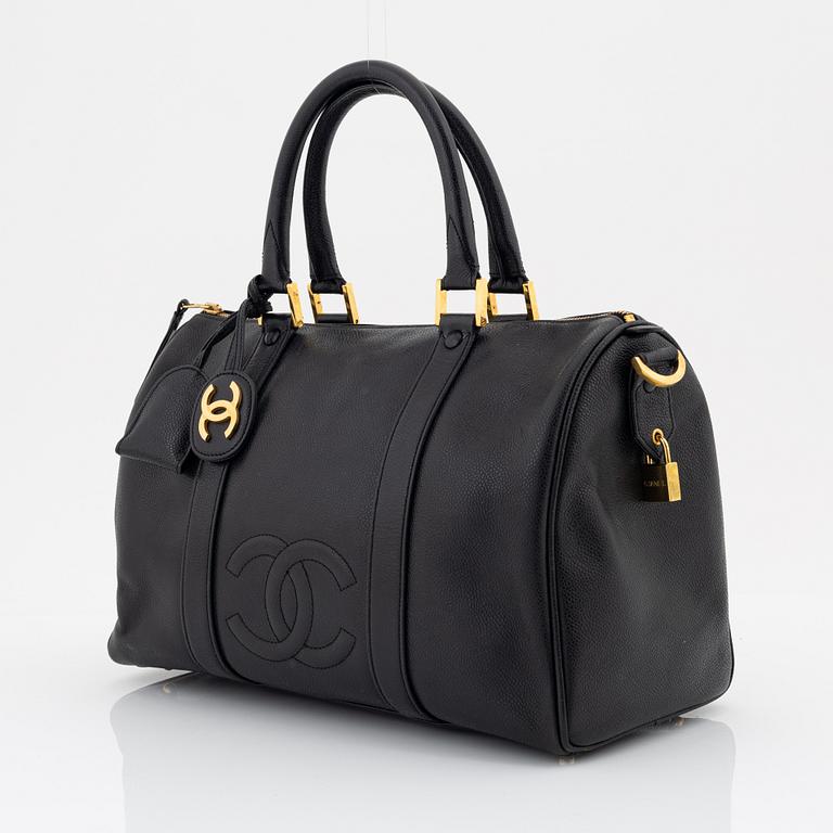 Chanel, a black caviar leather 'Boston bag'.