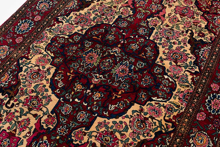 An antique Isfahan rug, Central Persia, c 234 x 146 cm.