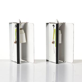 Charlotte Perriand, a pair of wall lights model "CP1", La Société Centrale d'Eclairage, France, 1960s.
