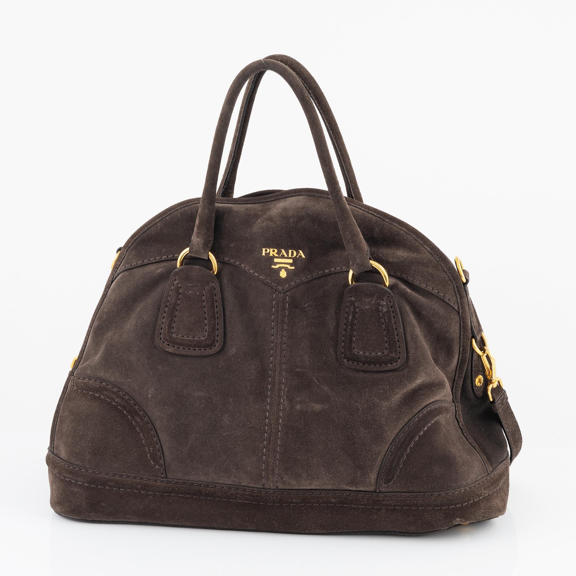 Prada, a chocolate brown suede handbag.