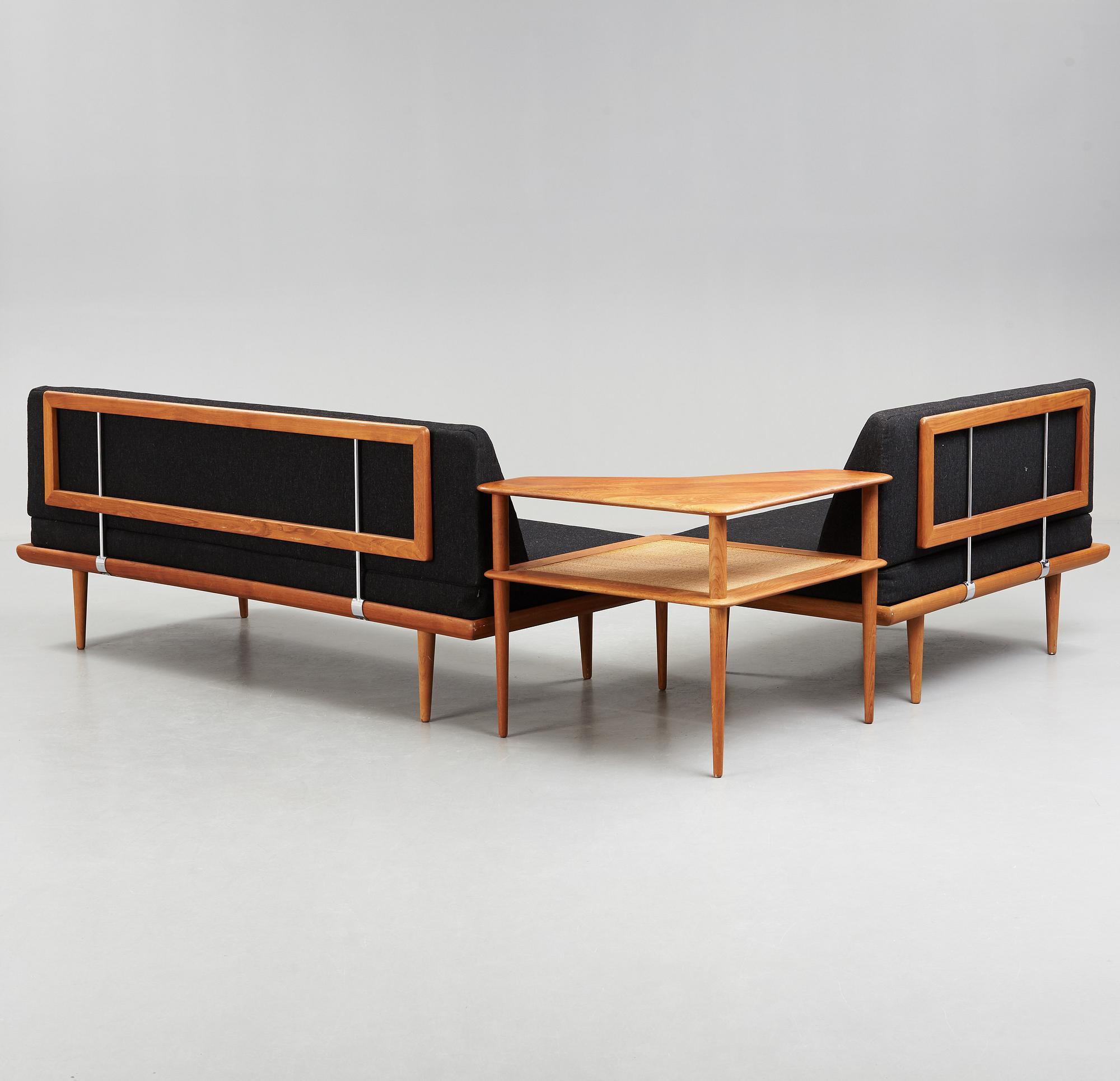 A set of two Danish 'Minerva' sofas with a table for France & Daverkosen.