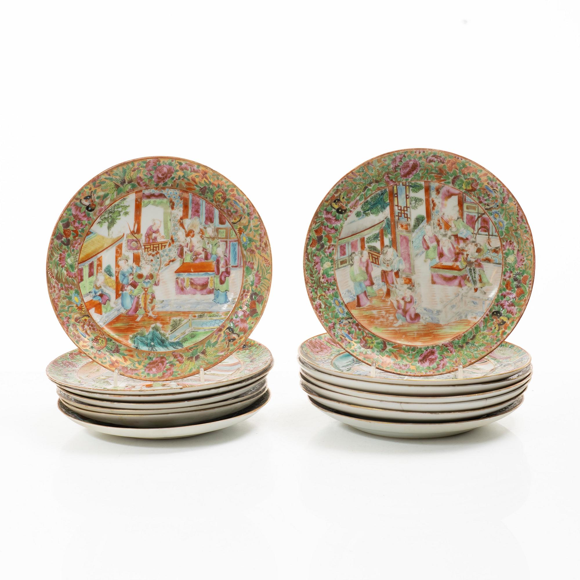 A matched set of 14 famille rose 'Canton' dinner plates, Qing dynasty, 19th century.