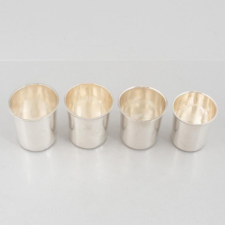 Four French silver beakers, Paris, 19th Century.