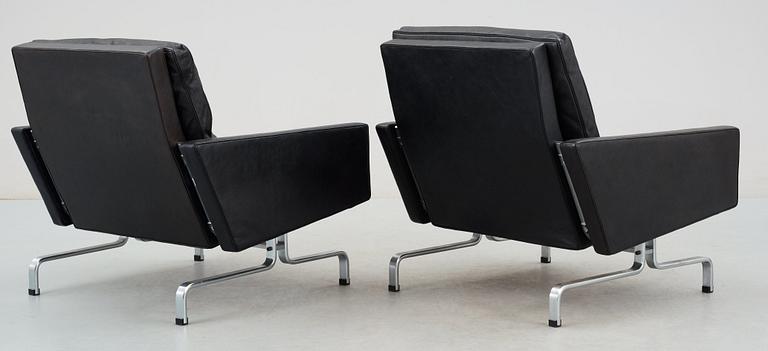 A pair of Poul Kjaerholm 'PK-31' black leather easy chairs, E Kold Christensen, Denmark.