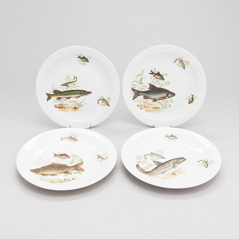 A 25-piece porcelain fish dinnerware set for Rörstrand.