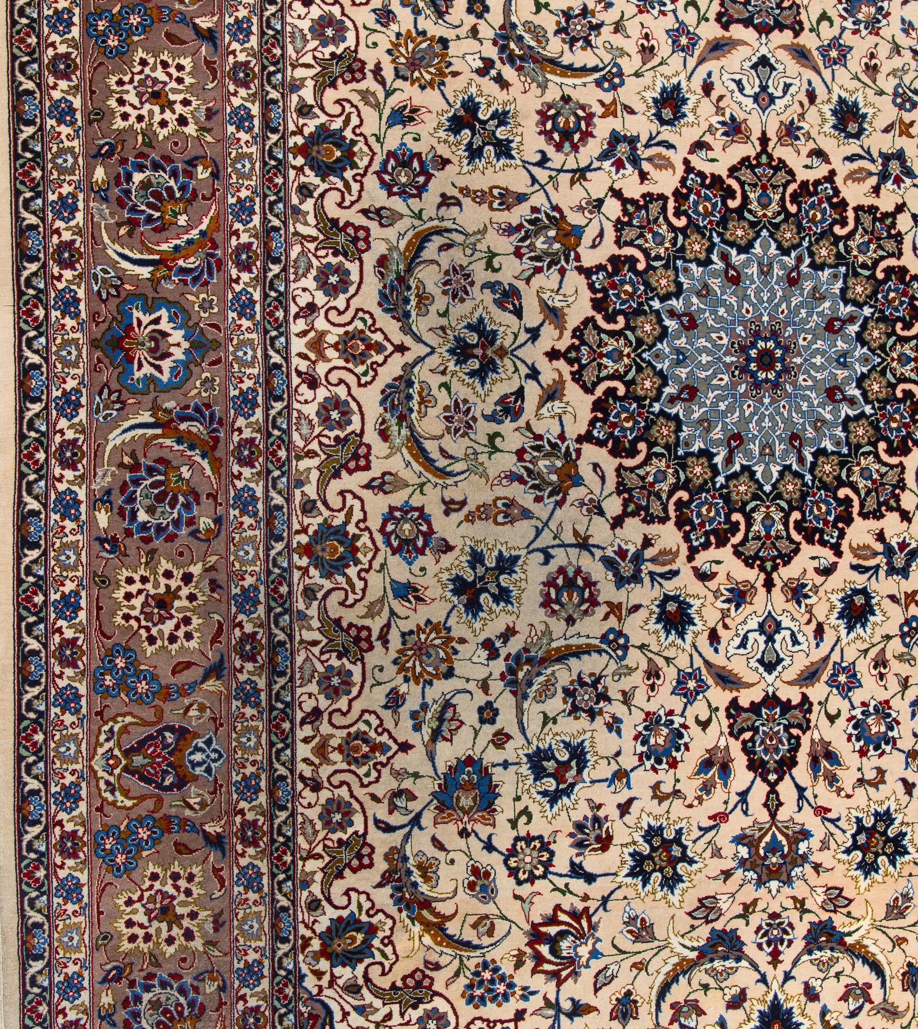 A semi-antique Isfahan rug, central Persia, signed c. 238 x 165 cm.