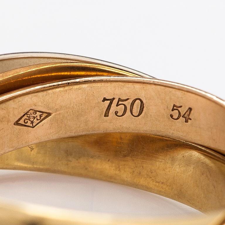 les must de Cartier, ring "Trinity", 18K guld. Märkt les must de Cartier, A5512Y.